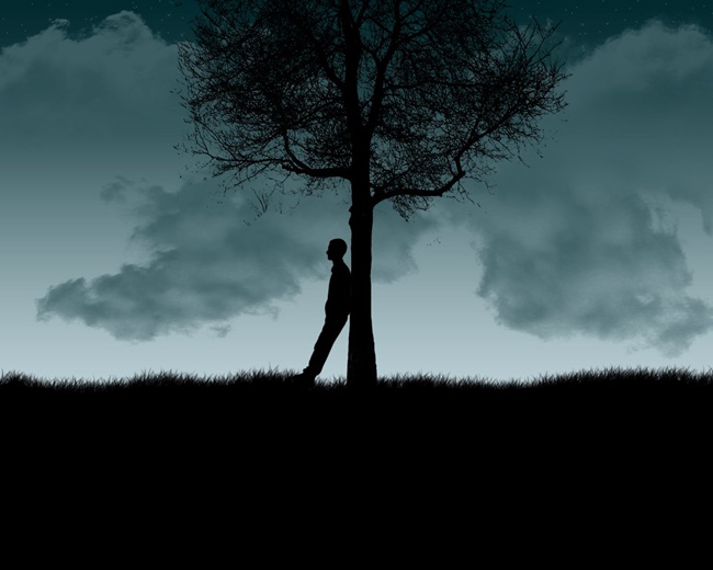 Hình ảnh đầy cô đơn của chàng trai dưới bóng cây