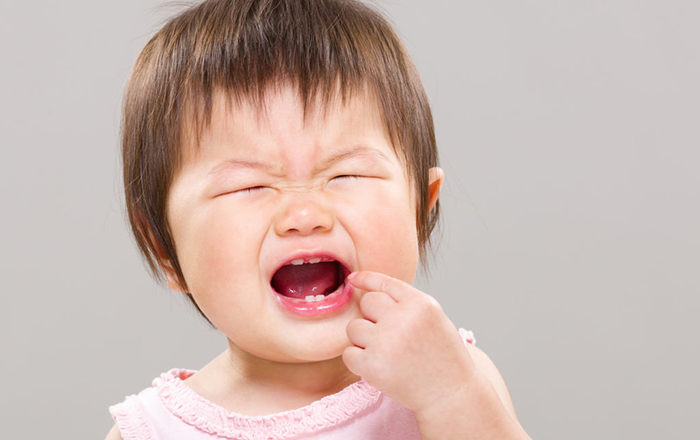 7 dấu hiệu trẻ mọc răng